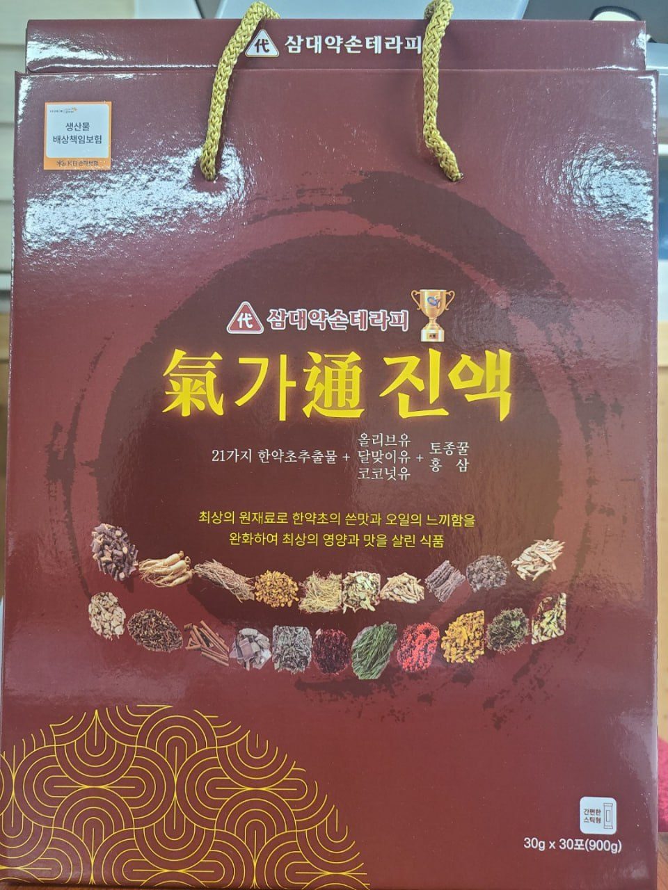 기가통진액 30g×30포 제품과 쇼핑백